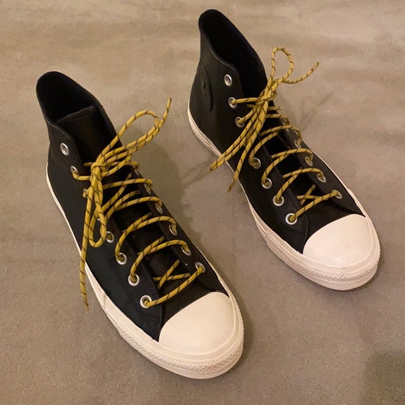 black converse with yellow laces